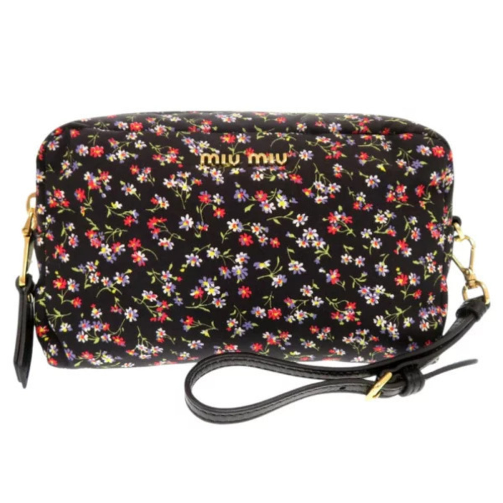 Miu Miu black floral cosmetic wrist strap